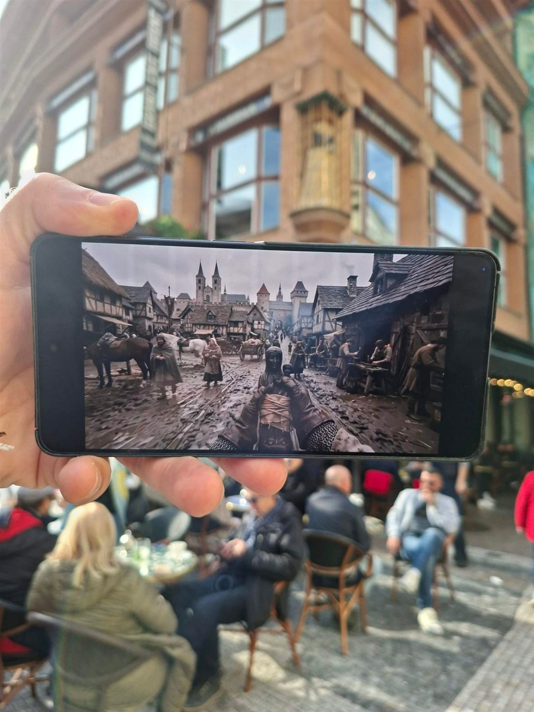 A medieval street scene on a phone in Celetná Street